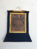 Vintage Buddha Mandala Thangka With Earthly Toned Colors highlighted by Beautiful Yellow Border and Blue Brocade